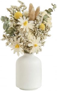 white vase with fresh flowers