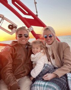 McClellan Grimm with her husband and daughter on a boat