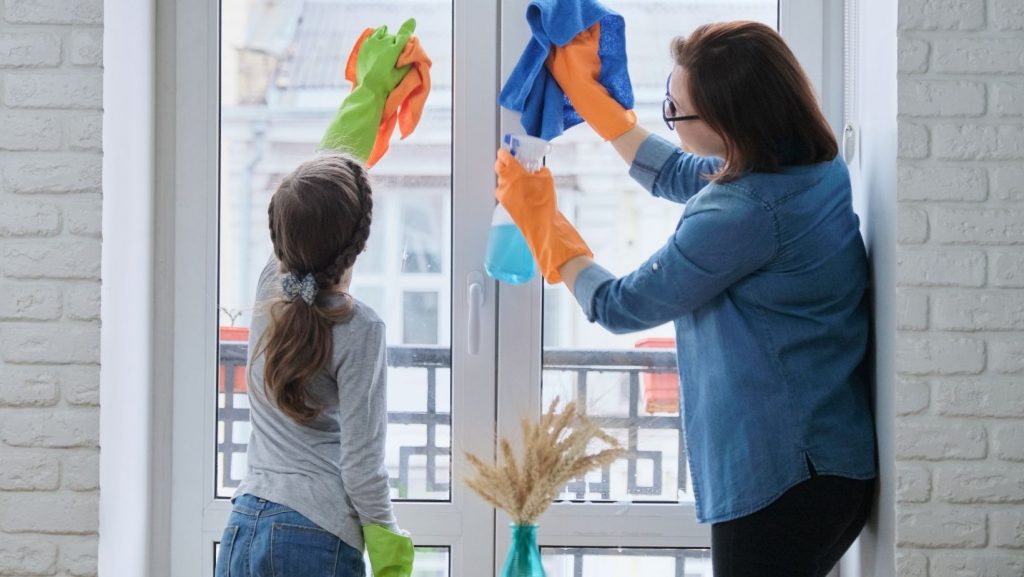 Mom and daughter spring cleaning