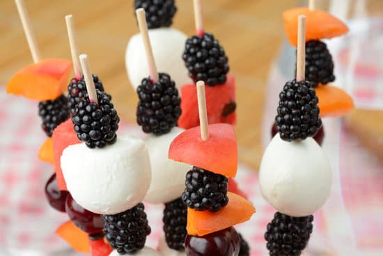 Snack ideas. Skewers of fruit and cheese. 