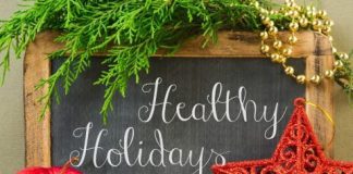 Healthy Holidays sign - words on chalkboard with decoration