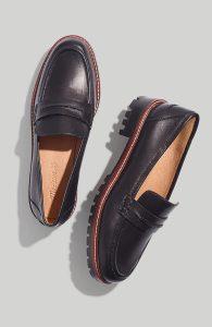 a pair of black loafers